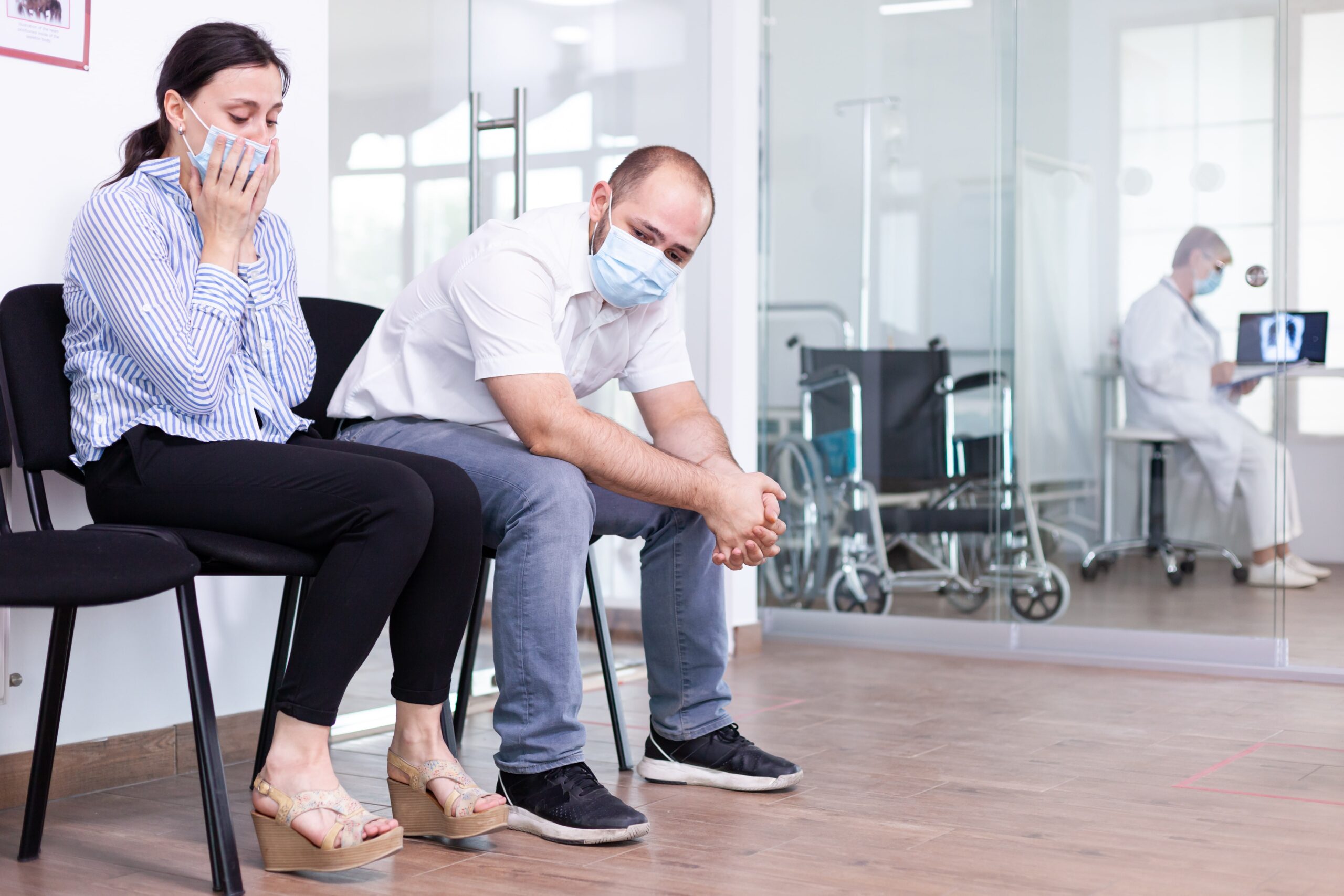 upset couple in hospital waiting room